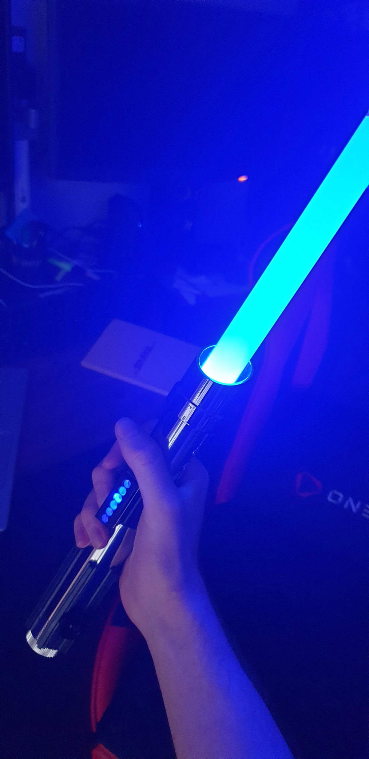 Customer with AstraSabers lightsaber